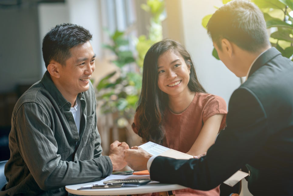 Young couple meeting with insurance advisor