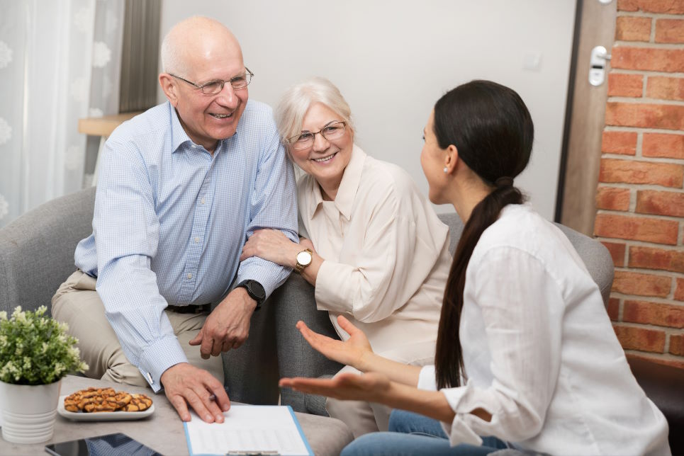 Senior couple speaking with financial advisor