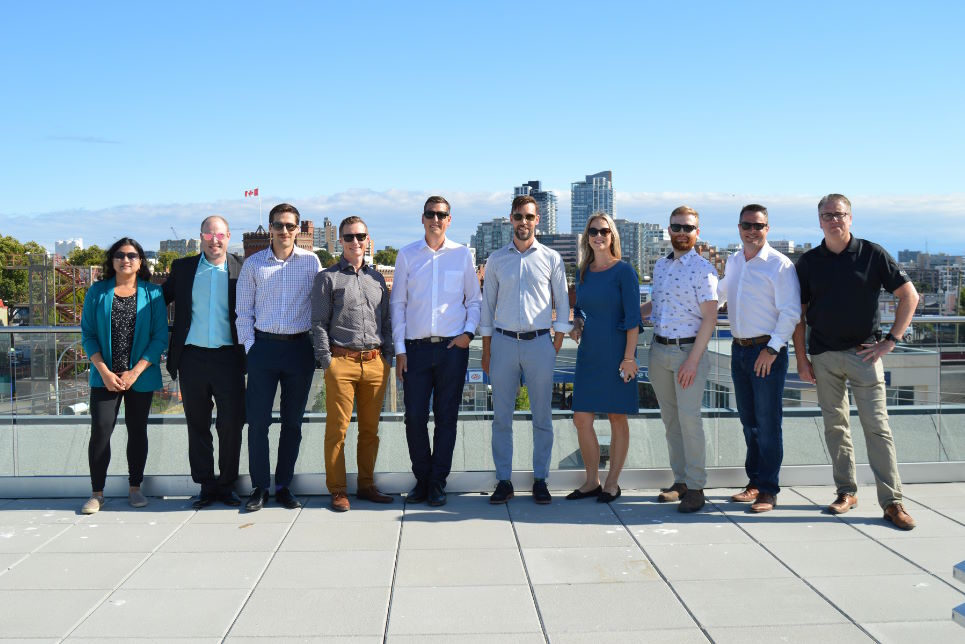 Alitis team on rooftop in Victoria