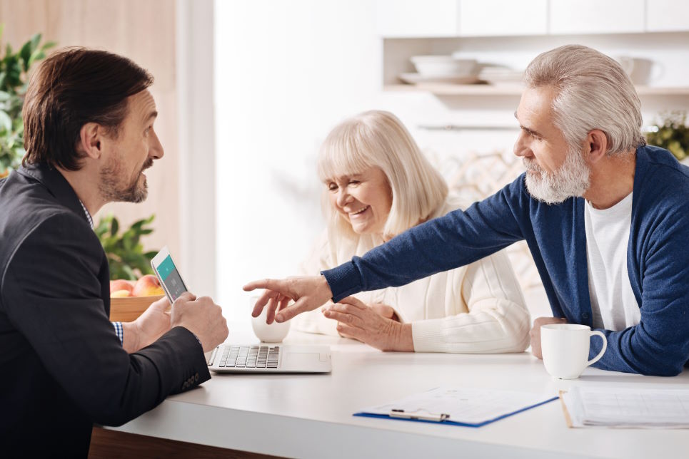 Older couple meeting financial advisor