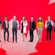 Group of people in a line superimposed on a bright red maple leaf background